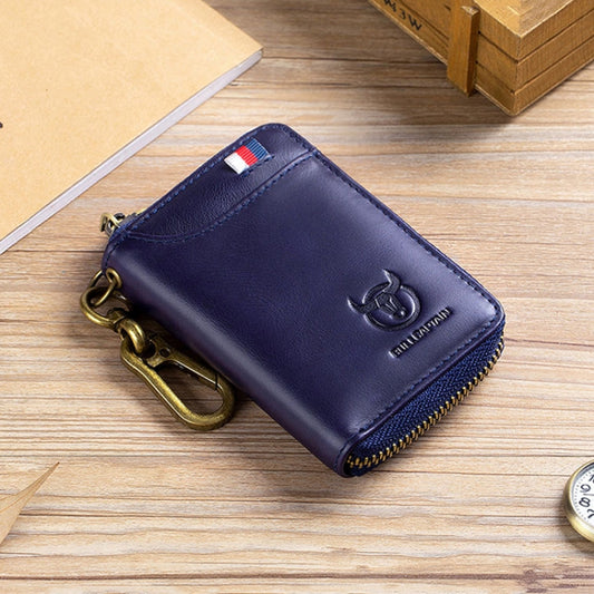 Blue leather coin purse with zipper and brass key clip, small card slot detail