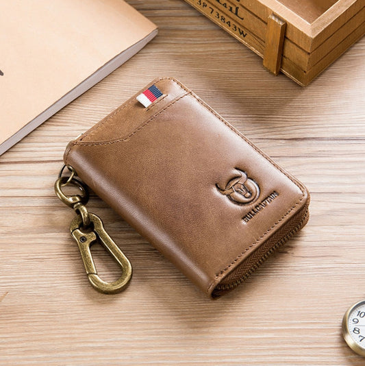 Brown leather coin purse with zipper and brass key clip, embroidered logo patch