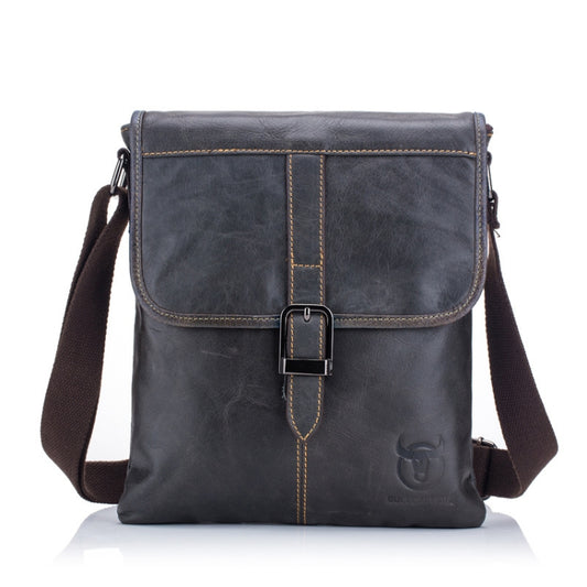 Men's dark blue leather shoulder bag with front flap, metal buckle closure, and crossbody strap.