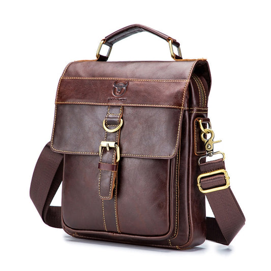 Brown leather shoulder bag with front flap, buckle straps, top handles, crossbody strap