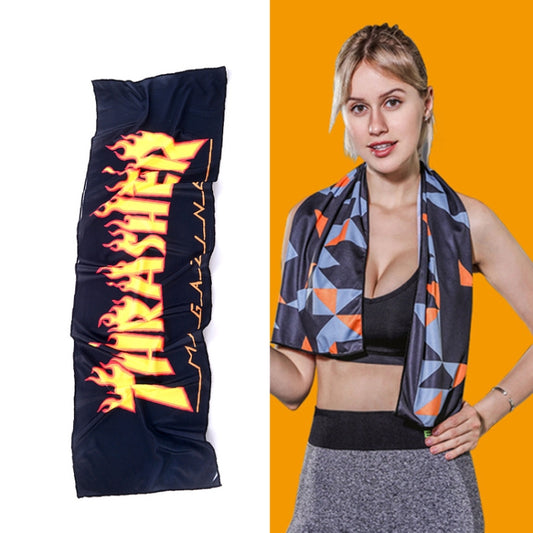 Quick-drying sports towel, dark navy with orange flame-style text and graphics.