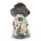 Dog beach shirt in pink, green, and yellow jungle leaf print with short sleeves