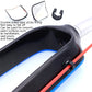 Bicycle seat frame cable guide clip with adhesive tape, holding red wire