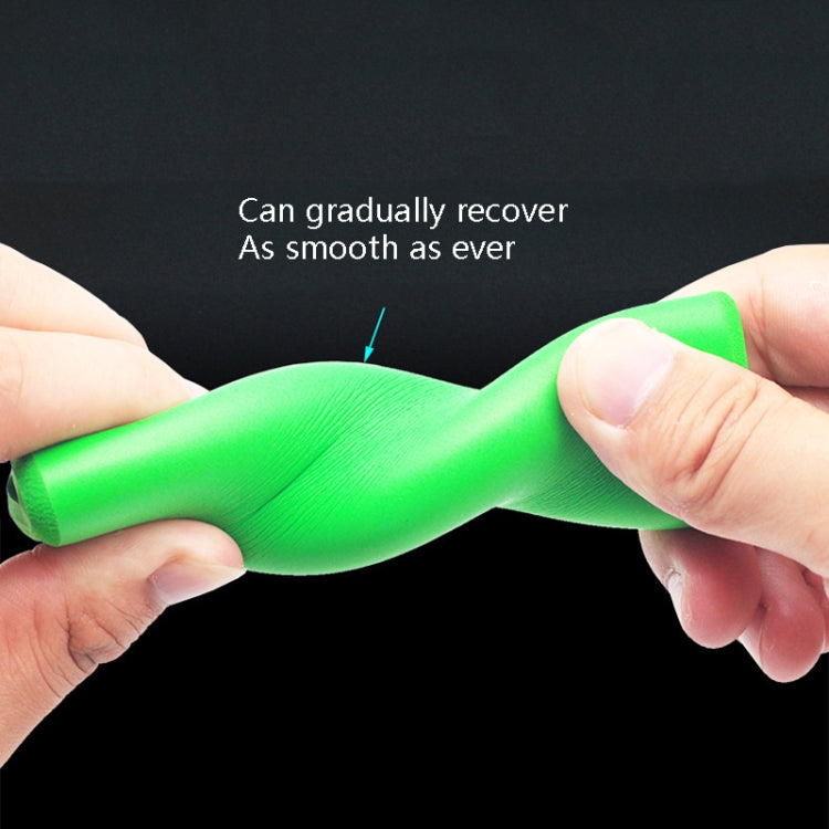 Foam bicycle handlebar grip cover in green, flexible anti-slip texture held by hands