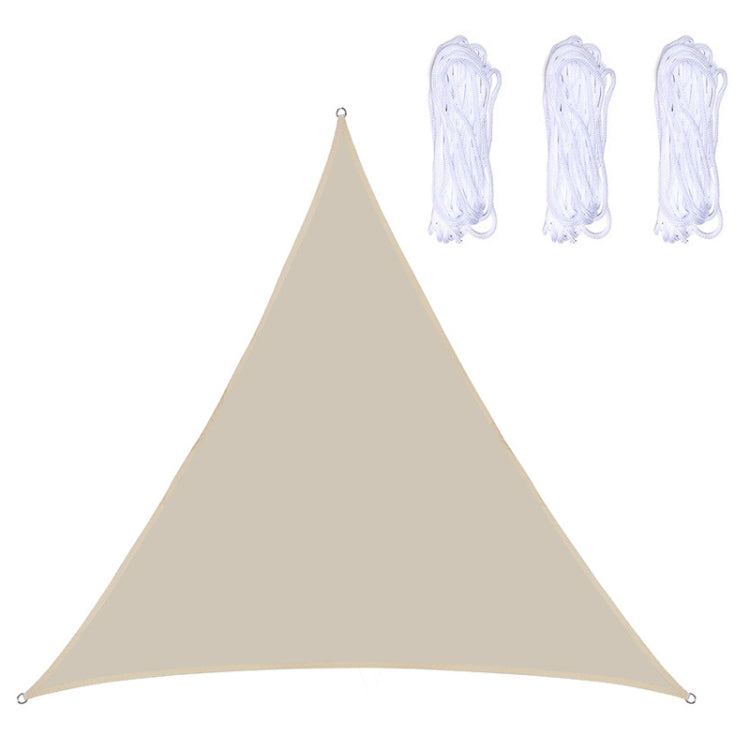Beige triangular outdoor sunshade sail canopy with grommets and rope loops