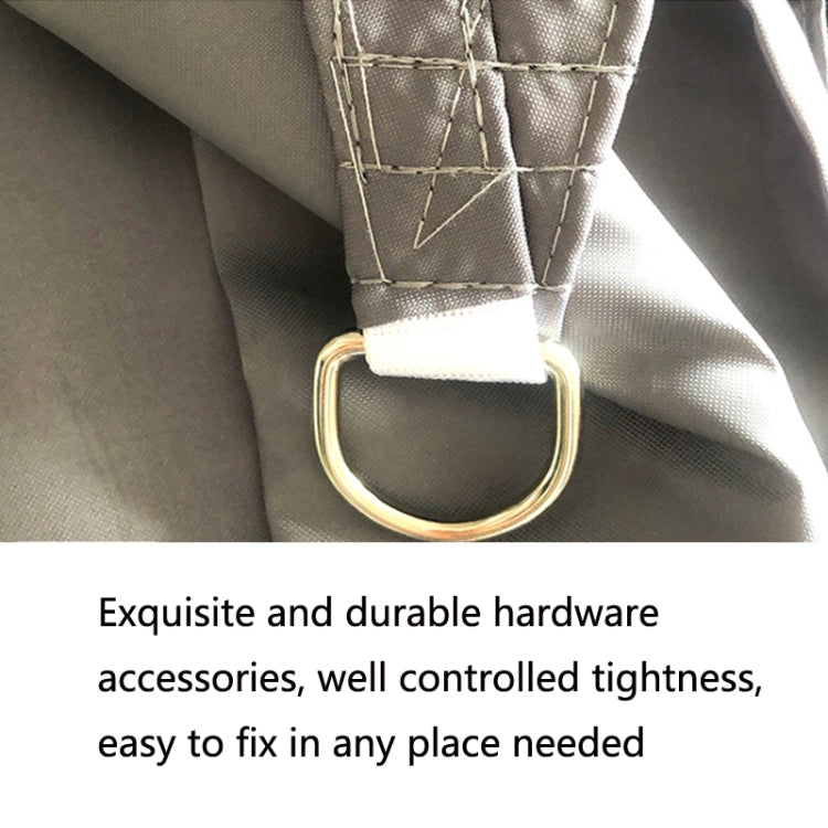Metal D-ring hardware with fabric loop on gray shade sail corner