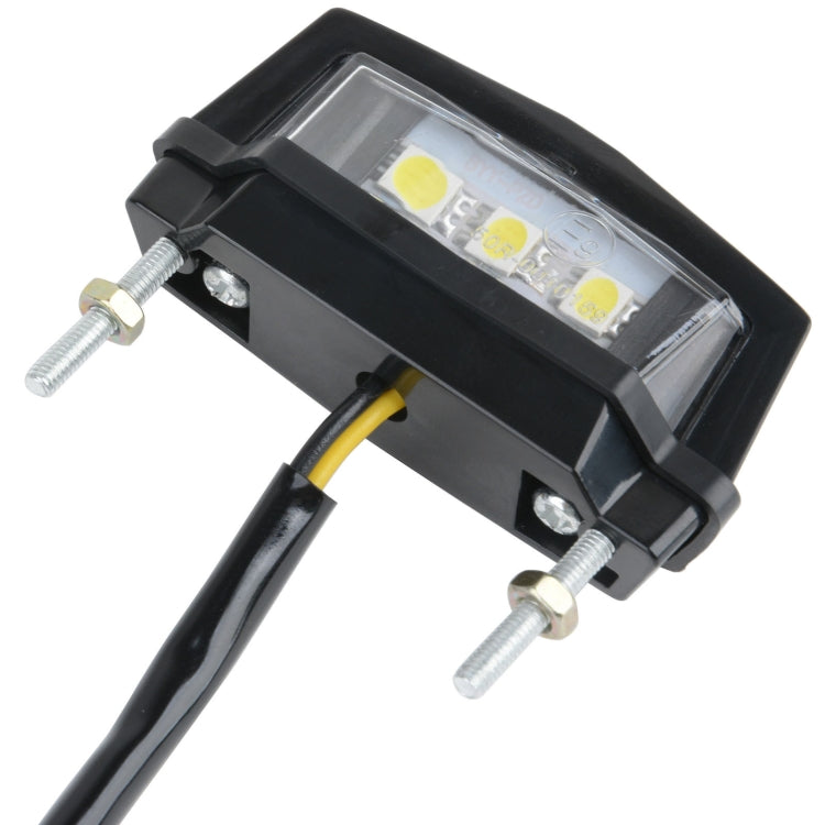 Motorcycle LED license plate taillight light, close-up of clear lens and LED chips