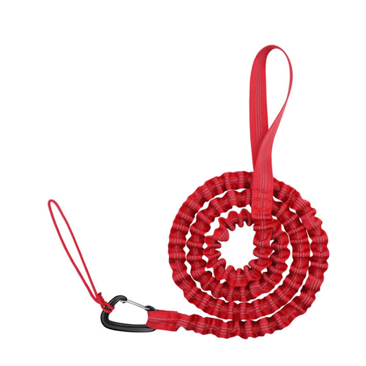 Red coiled bicycle tow rope with loop handle and carabiner end