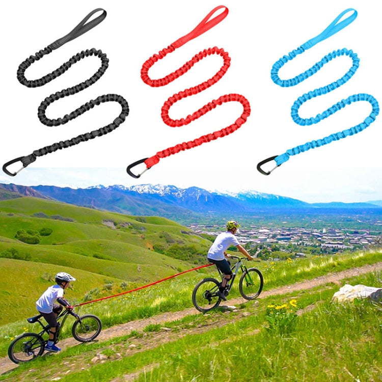 Bicycle tow rope set with coiled red, blue, and black straps