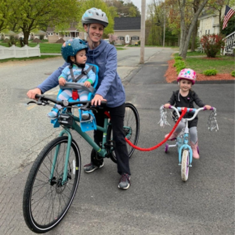 Red bicycle tow rope with coiled section and carabiner connector