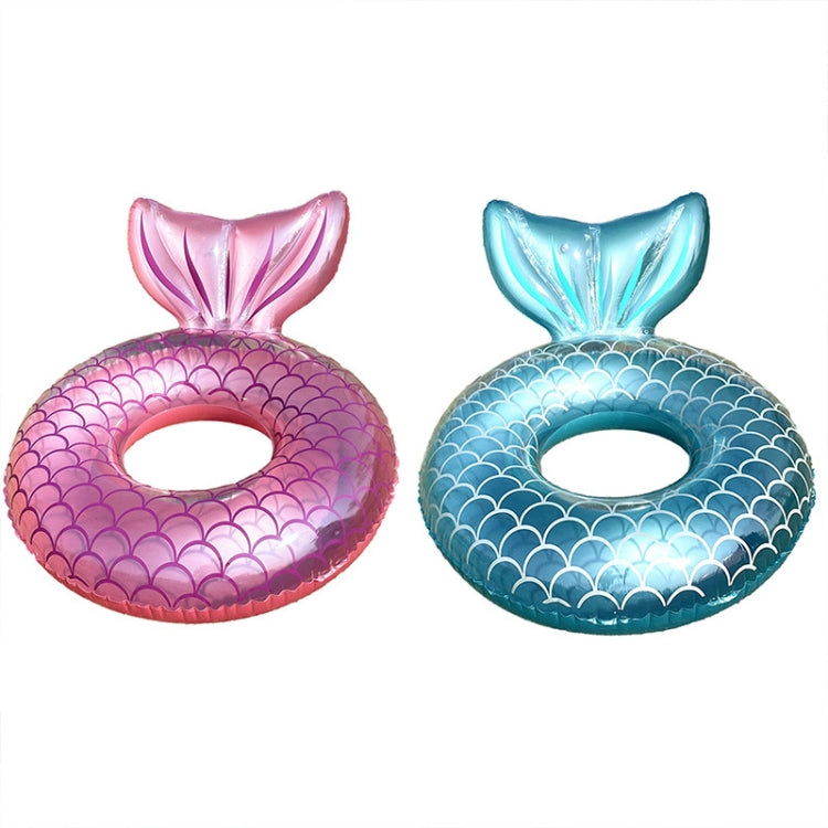Pink and blue mermaid swimming rings with scalloped scale pattern and top fin