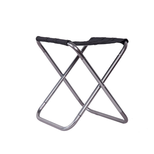 Silver gray folding camping chair with black fabric seat and cross metal legs