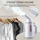 Handheld garment steamer with nozzle, releasing steam toward hanging clothes