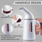 Handheld garment steamer with removable nozzle and easy-to-clean base