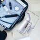 Handheld garment steamer with UK-style plug, compact size for travel and storage