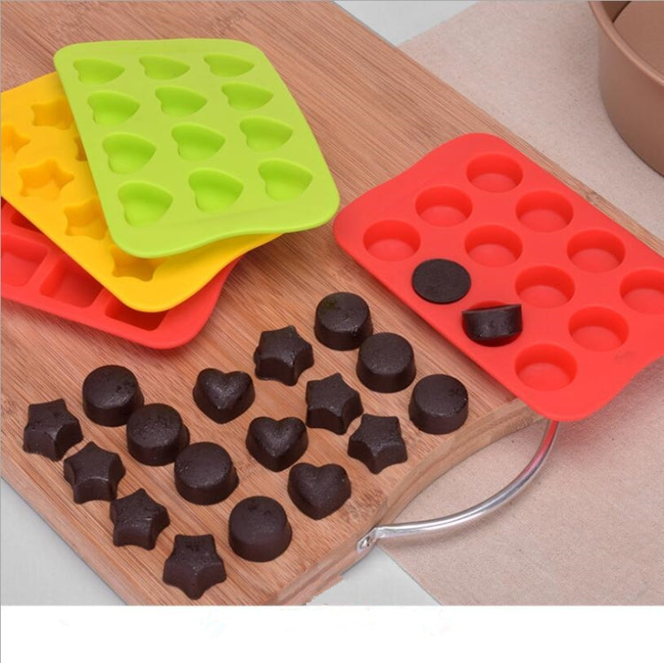 Silicone chocolate or ice cube mold tray with multiple cavity shapes in green and red