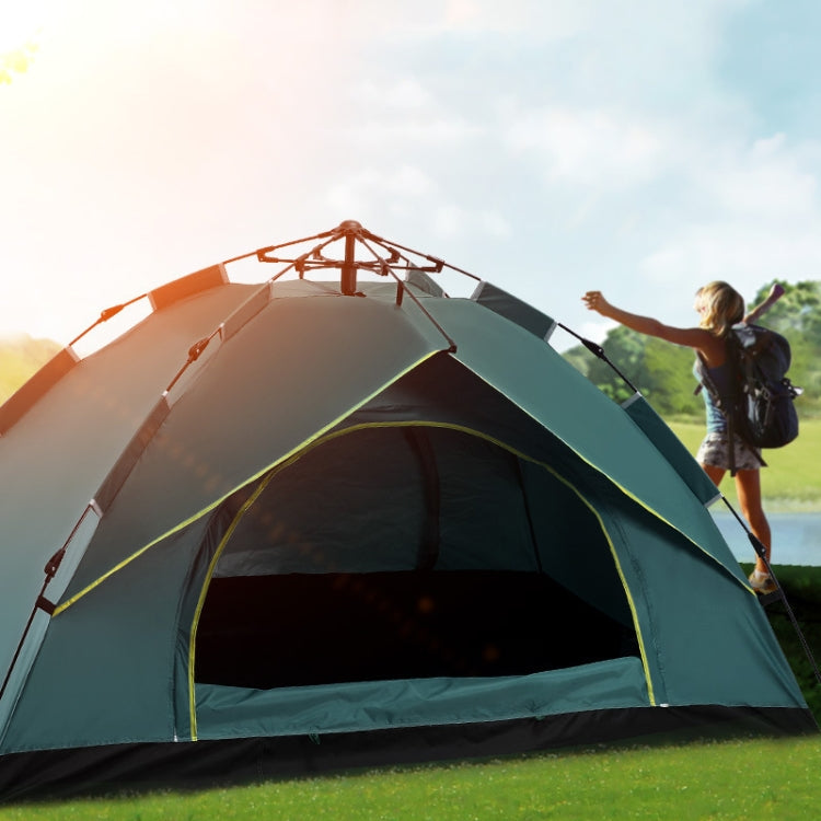 Orange and green automatic camping tent with large front opening, dome style