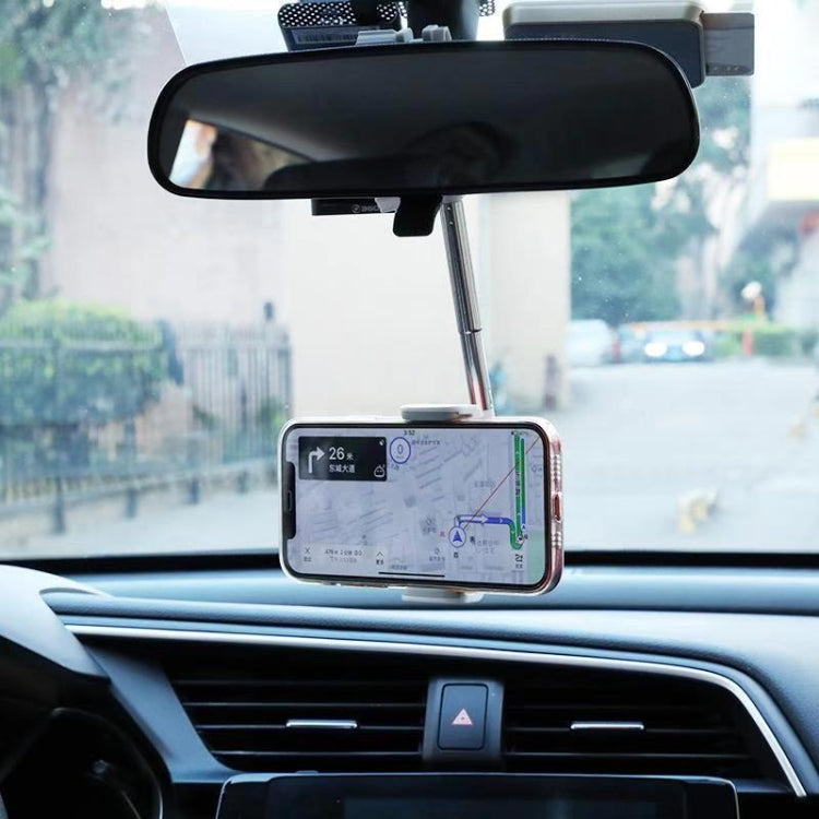 Car phone bracket mounted under rearview mirror, holding a smartphone