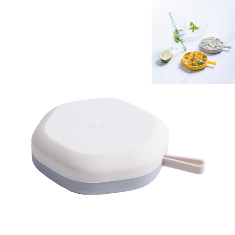 White hexagonal ice cube tray with hinged storage box and side handle
