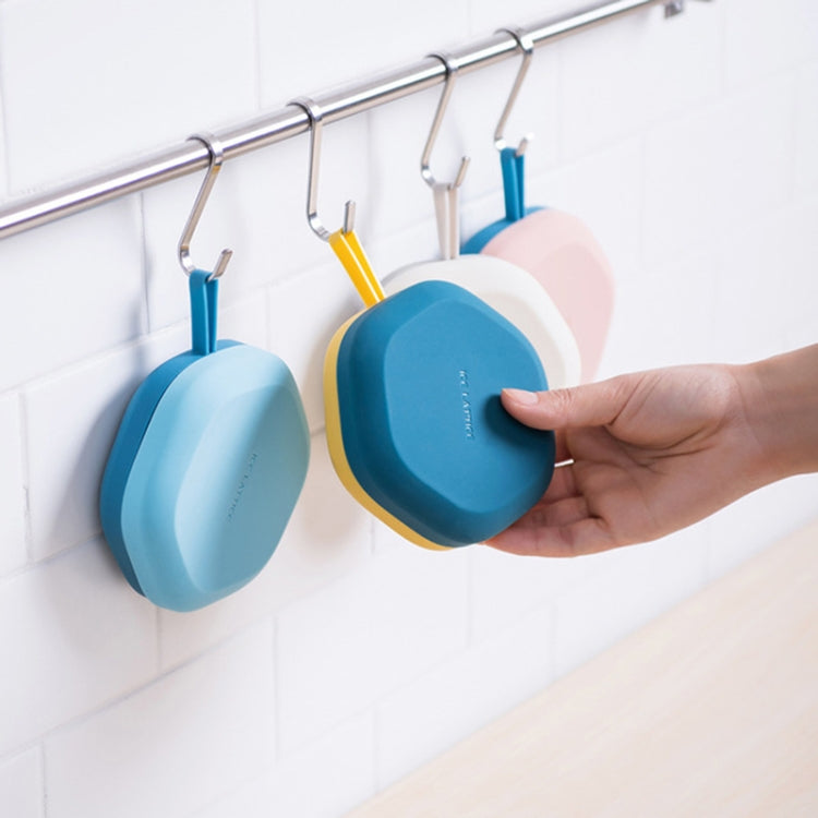 Hexagonal ice cube trays hanging on wall rack in blue tones