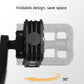 Black folding bicycle pedal shown at a folded angle, side view
