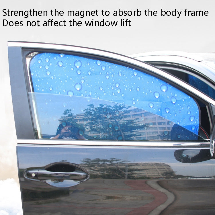 Blue magnetic sunshade panel on car window with water droplets visible across surface.