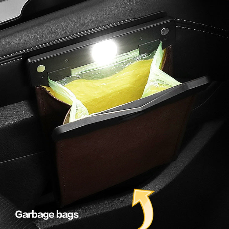 Car trash storage bag with bright LED light holding garbage bags inside