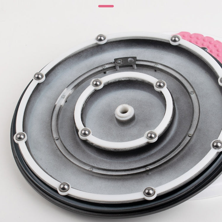 Underside of twisting machine with metal ring and central hub