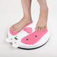 User feet on bear-shaped twisting machine with pink textured pads and white base