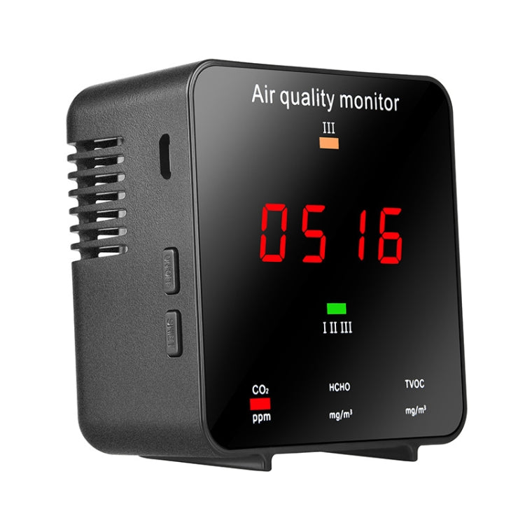 Portable air quality monitor side view with vent grille and red 0.5/1.6 readings