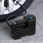 Portable electric car air pump with connected hose and blue display, black