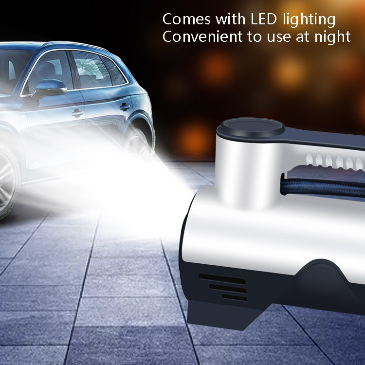 Portable car tire inflator pump with built-in LED light shining from the top housing