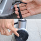 Hand using car tire inflator nozzle on valve stem with power cable connected to pump