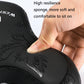 Black bicycle saddle cushion with eagle embossed texture, shown under hand pressure.