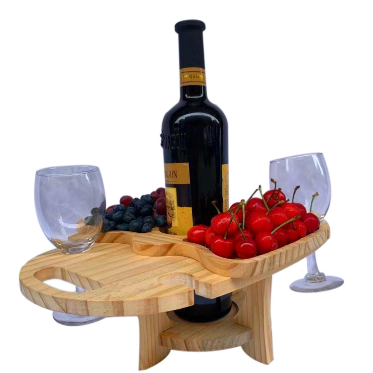 Foldable wooden wine rack picnic table with wine bottle and two stem glasses