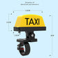 Yellow TAXI taxi-style light with black clamp mount and cylindrical front lamp
