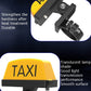 Yellow TAXI warning light with black mount and translucent lamp shade area