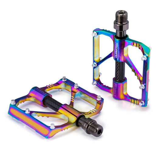 Rainbow CNC aluminum bike pedals with black anti-slip inserts and threaded steel axle