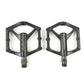 Pair of black aluminum bicycle platform pedals with threaded pins and PROMEND branding