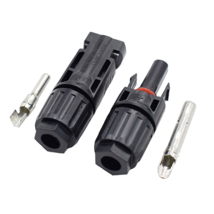 MC4 solar connector pair with black waterproof housings and metal contact pins
