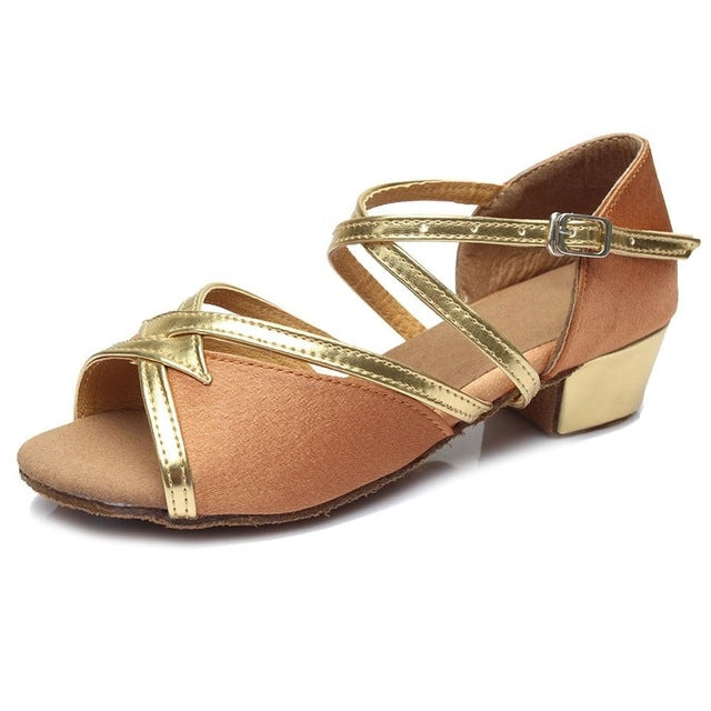 Brown low-heel dance shoes with gold trim, ankle strap, and open toe