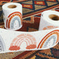 Rainbow border sticker roll with printed arches and clouds on a white backing