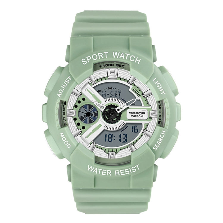 Green silicone waterproof sport watch with silver bezel, blue digital time display