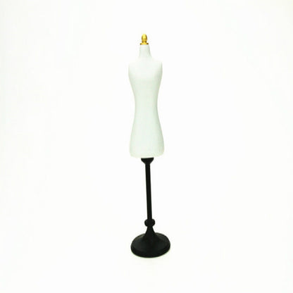 Mini white dress form mannequin with gold top and black round base for dollhouse scale