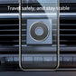 Magnetic phone holder disc mounted in car air vent, black with silver ring