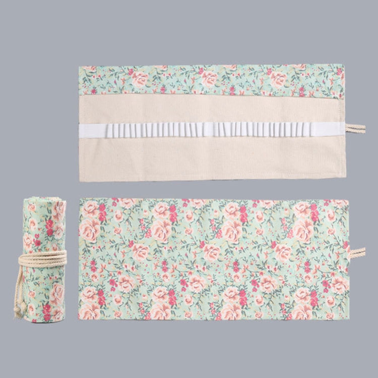 Floral canvas pen roll set: rolled pouch and flat wrap with beige base and stripe.