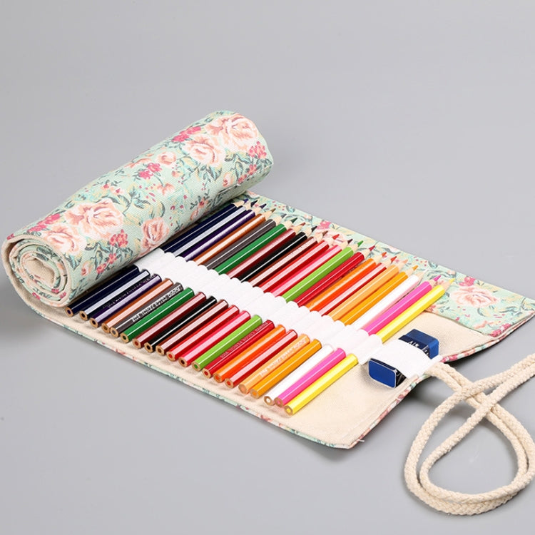 Floral pen roll opened with colored pencils in fabric slots and beige drawstring tie.