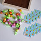 Carrot memory chess set with scattered colored carrot pawns and memory picture cards