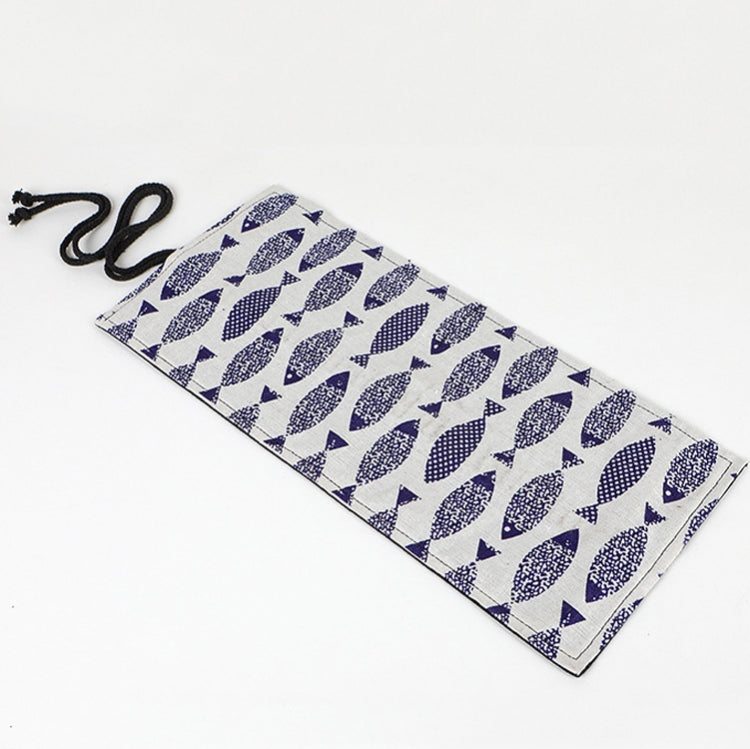 Rolled canvas pencil case with blue-and-white fish print and black tie cord