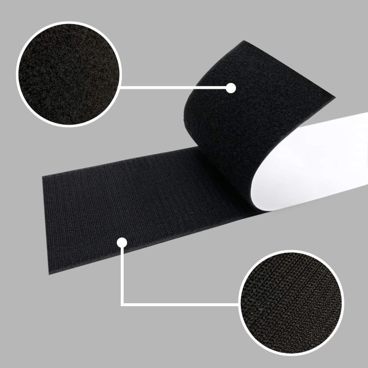 Black textured hook-and-loop fastener pieces touching for secure attachment